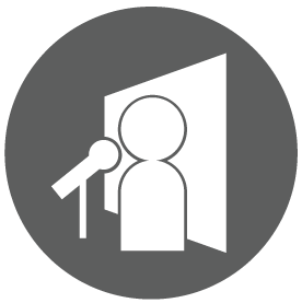Icon of a speaker at a microphone