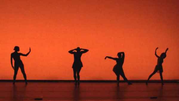 Four dancers on a stage