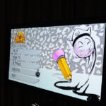 A computer screen, displaying a video game produced by the video game club
