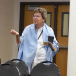 Past undergraduate research director asking a question during a presentation