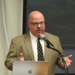 The vice provost speaking at a presentation
