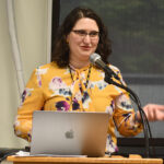 A fauculty member introducing the keynote speaker