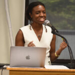 The keynote speaker discussing her past project