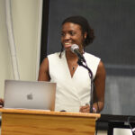 The keynote speaker discussing her past project